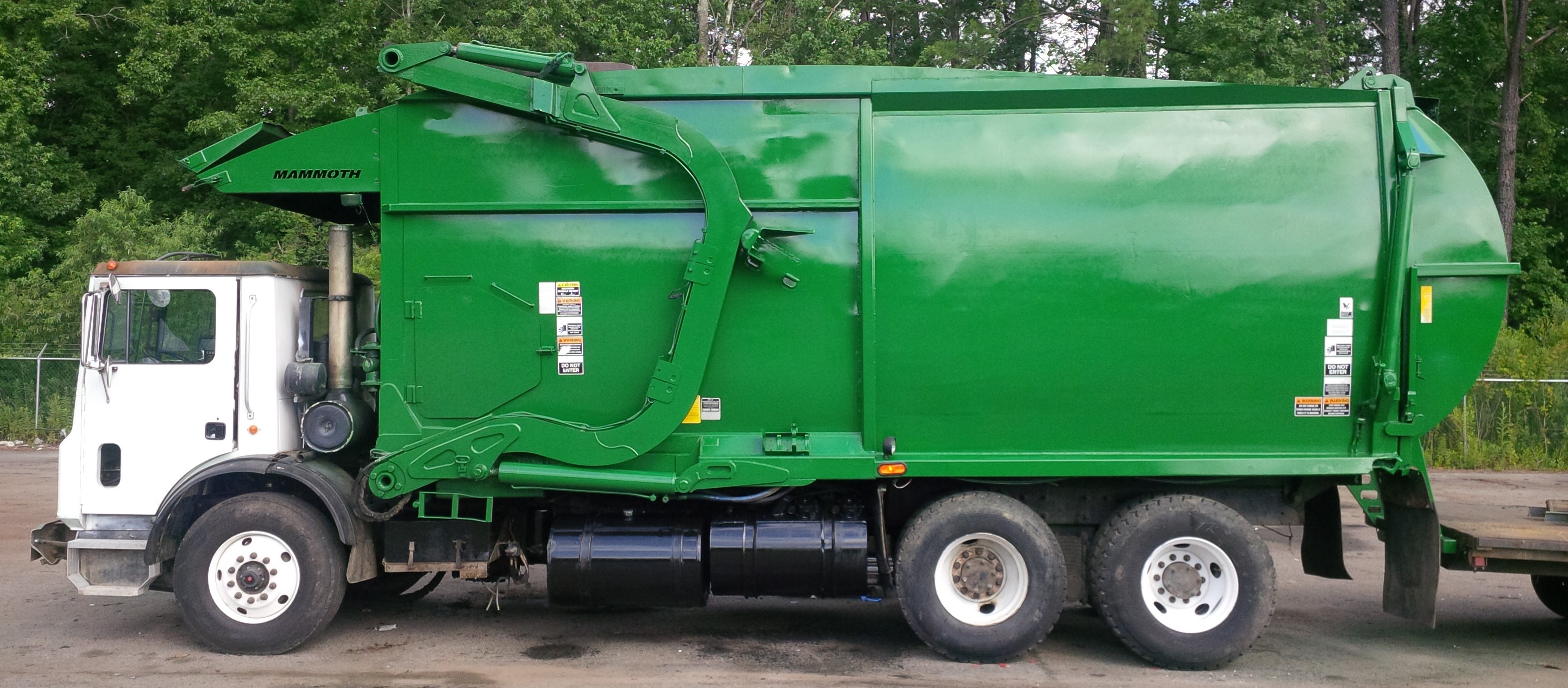 Garbage Truck Painting • Container Services Unlimited, Inc.